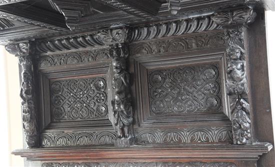 A 17th century style carved oak tester bed, overall W.5ft 3in. H.7ft 4.5in. L.7ft 4.5in.